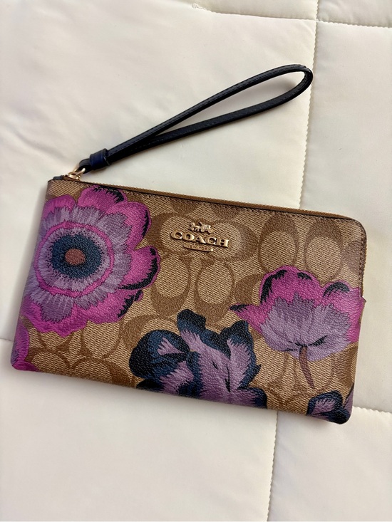 Coach Handbags - Coach Brown Signature Floral Wristlet with Purple Accents
